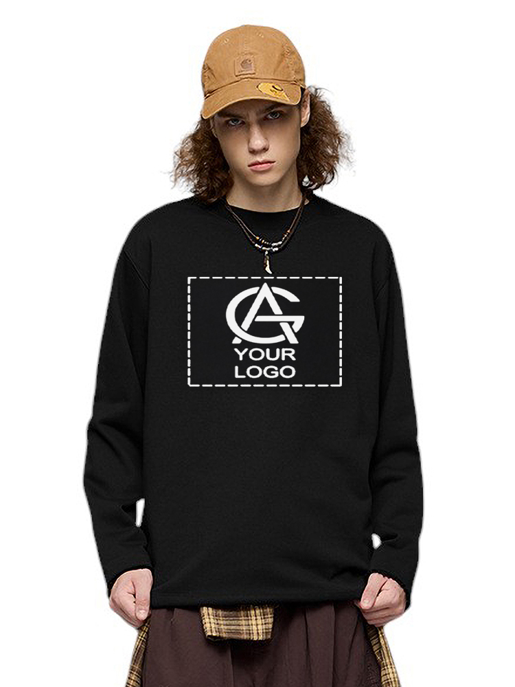 A person with shoulder-length curly hair wears a tan cap, a 370GSM unisex streetwear sweatshirt with a blank logo area reading "YOUR LOGO," a necklace, and a layered plaid shirt, standing against a plain white background.