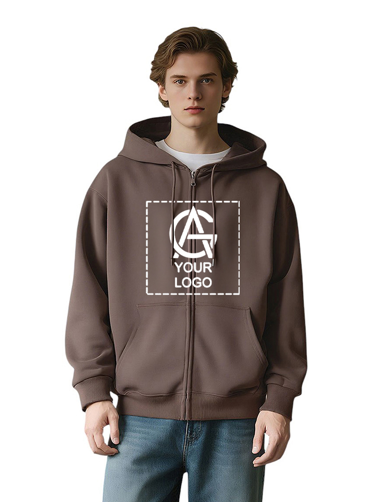 A young person wears a brown 350GSM zipper hooded sweatshirt with front pockets and a customizable "Your Logo" graphic in a dashed box on the chest. The individual is standing and facing forward.