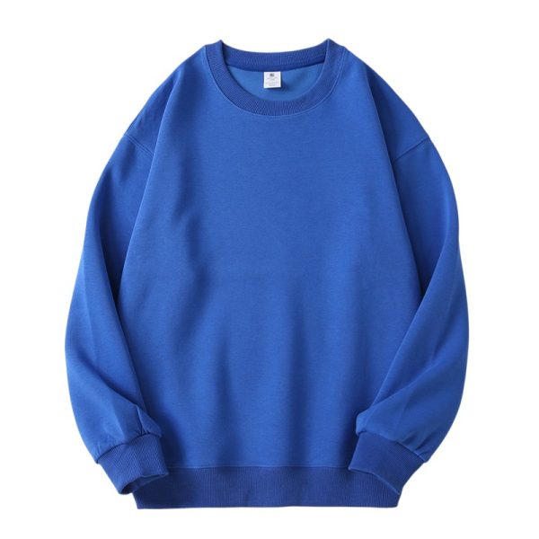 A plain blue crewneck sweatshirt with long sleeves and ribbed cuffs, collar, and hem, laid flat on a white background.