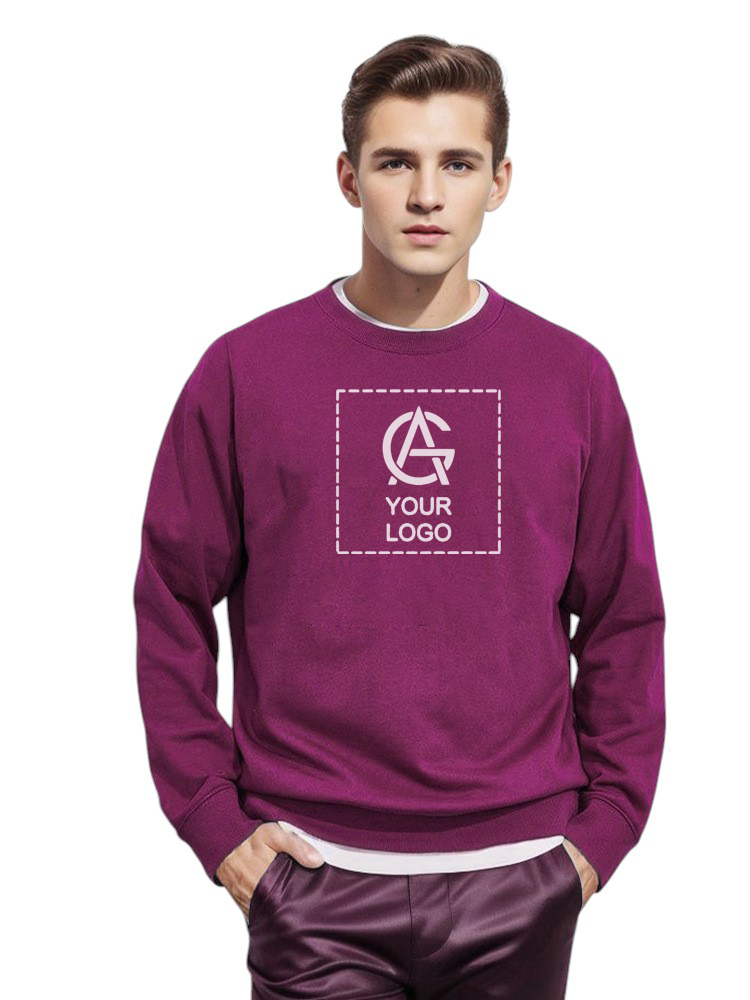 A young man stands facing forward, wearing a purple sweatshirt featuring a placeholder box with the text "YOUR LOGO" and a generic logo in the center. The background is plain white.