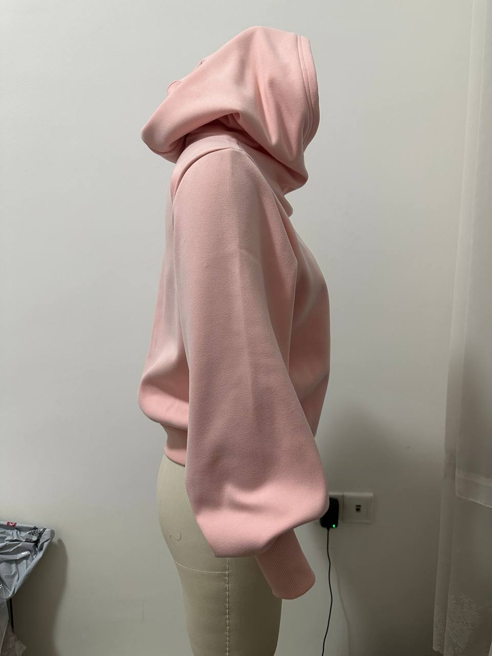 Side view of the revised hoodie showing the custom sleeve construction