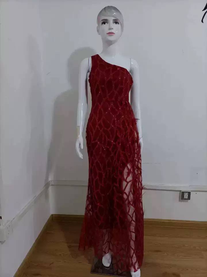 Burgundy one-shoulder evening dress displayed on a mannequin
