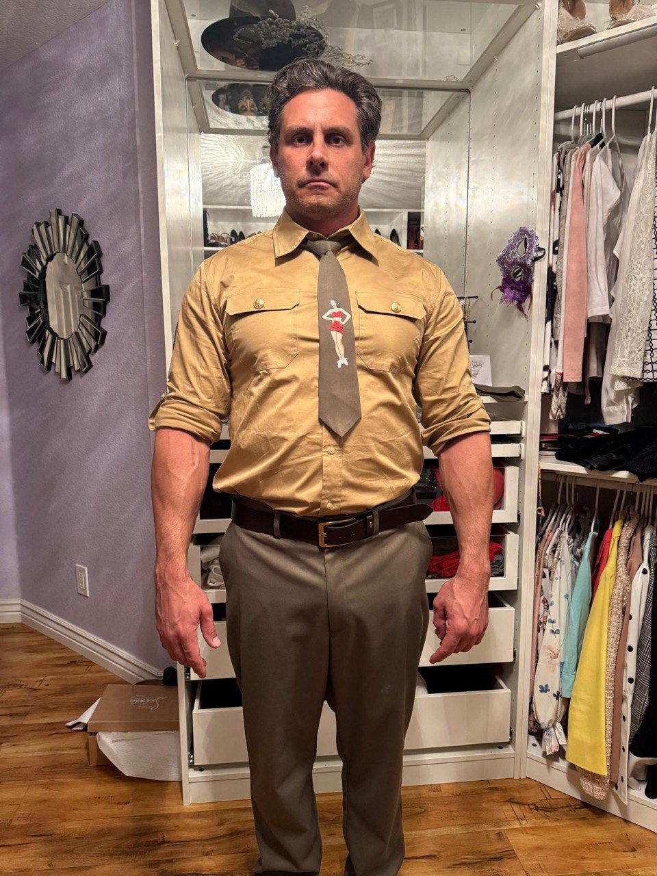 Men’s custom restaurant uniform with khaki shirt, olive trousers, and printed tie