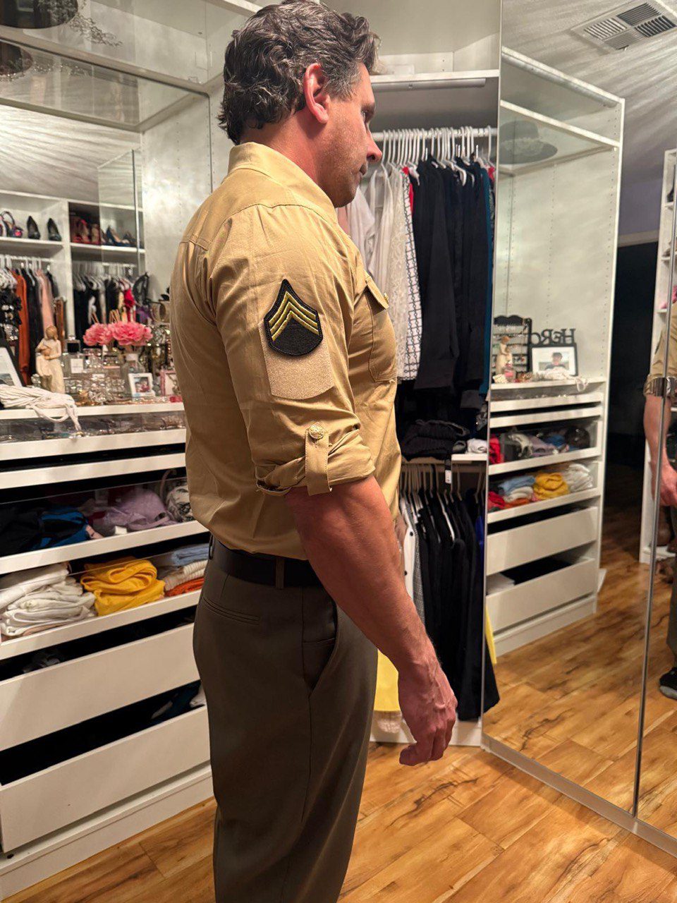 Side view of men’s custom restaurant uniform with rolled sleeve and interchangeable rank patch