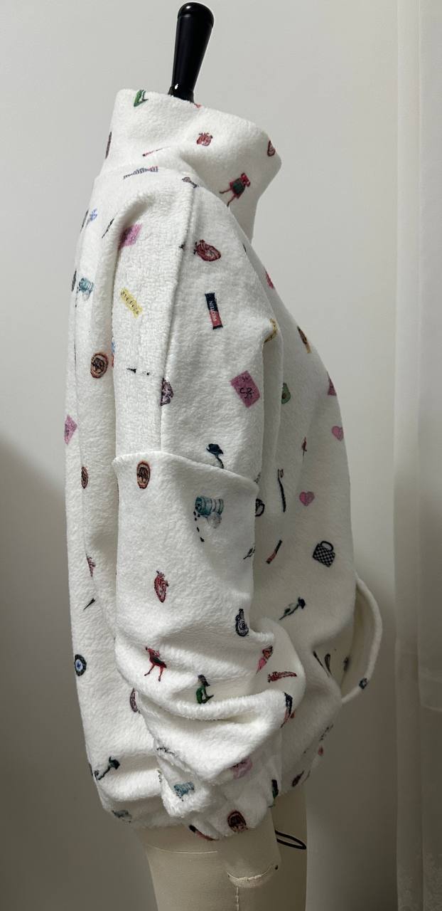 Side view of custom fleece hoodie showing sleeve fit and texture