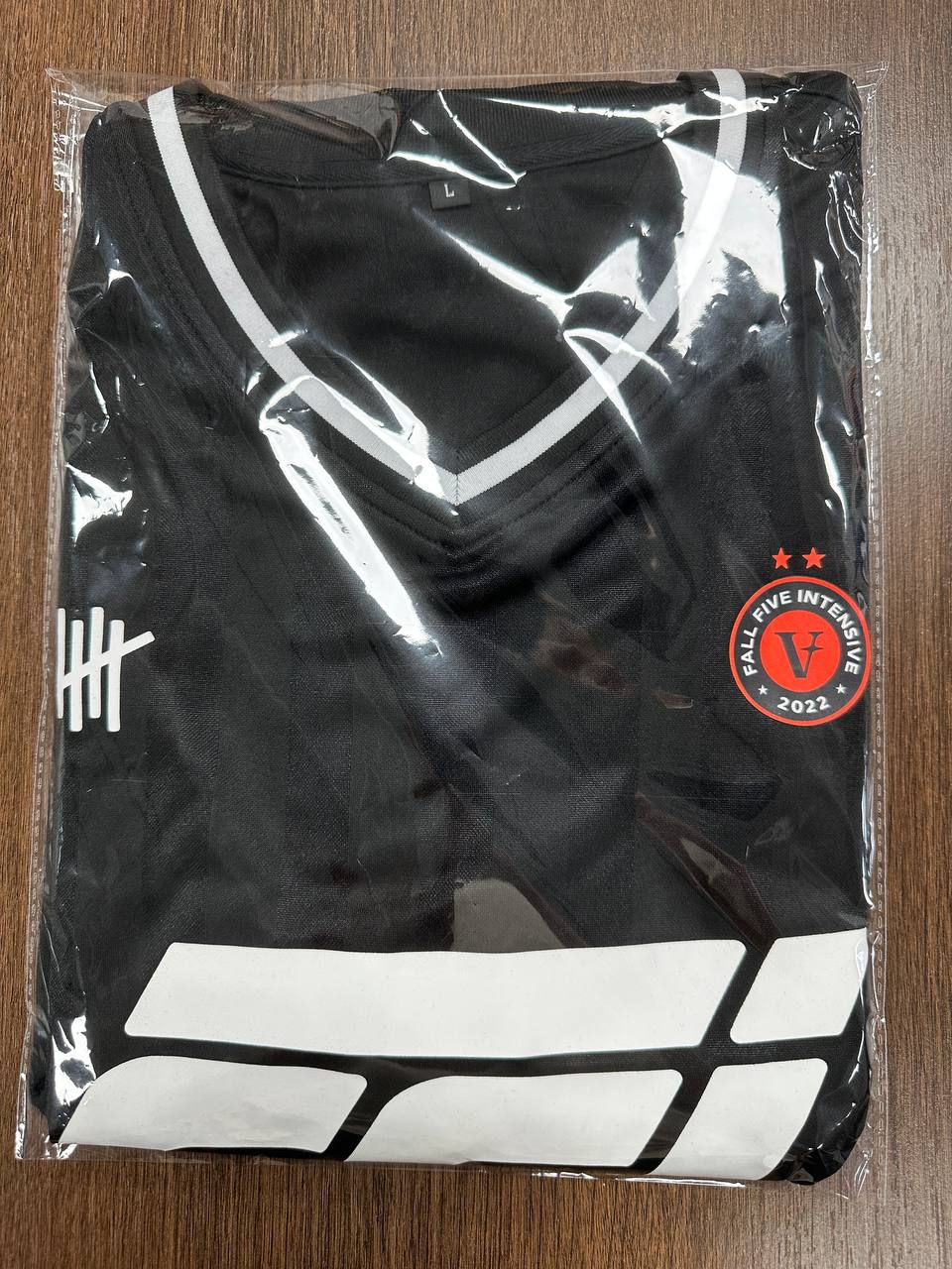 Custom black jersey packed for shipment after final production